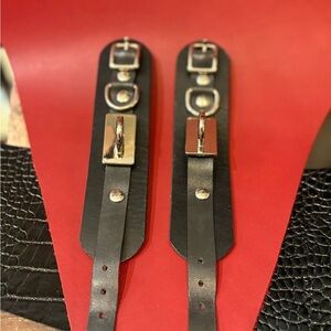 Elegant Black Wrist Cuffs with Silver Accent Hardware